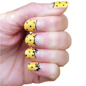 Yellow tips with spots and bows nail wraps on medium nails
