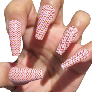 red and pink zig zag nail wrap on long nails